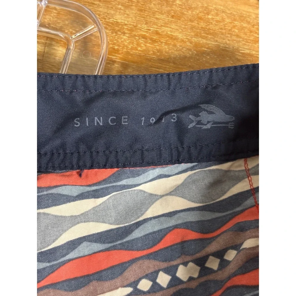 Patagonia Mens Board Shorts Size 35 Blue Red Geometric Wave Print Swim Trunks